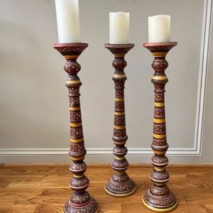 hand painted set of three candlesticks